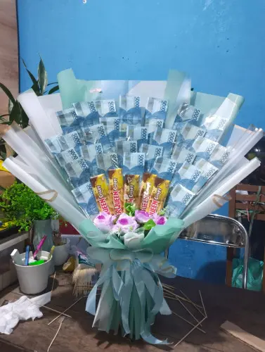 Buket Bunga Uang yayasansosialrumahdukapalangkaraya di Yayasan Sosial Rumah Duka Palangkaraya